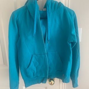 TNA zip up sweater